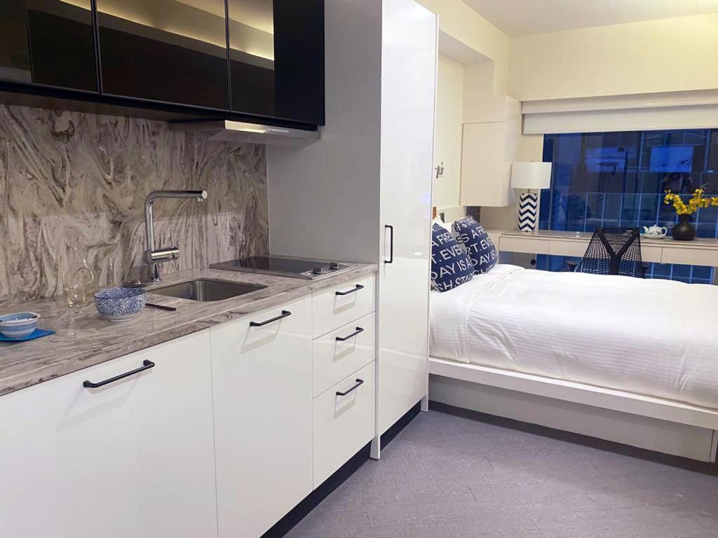 V Causeway Bay Aparthotel Hongkong Buitenkant foto